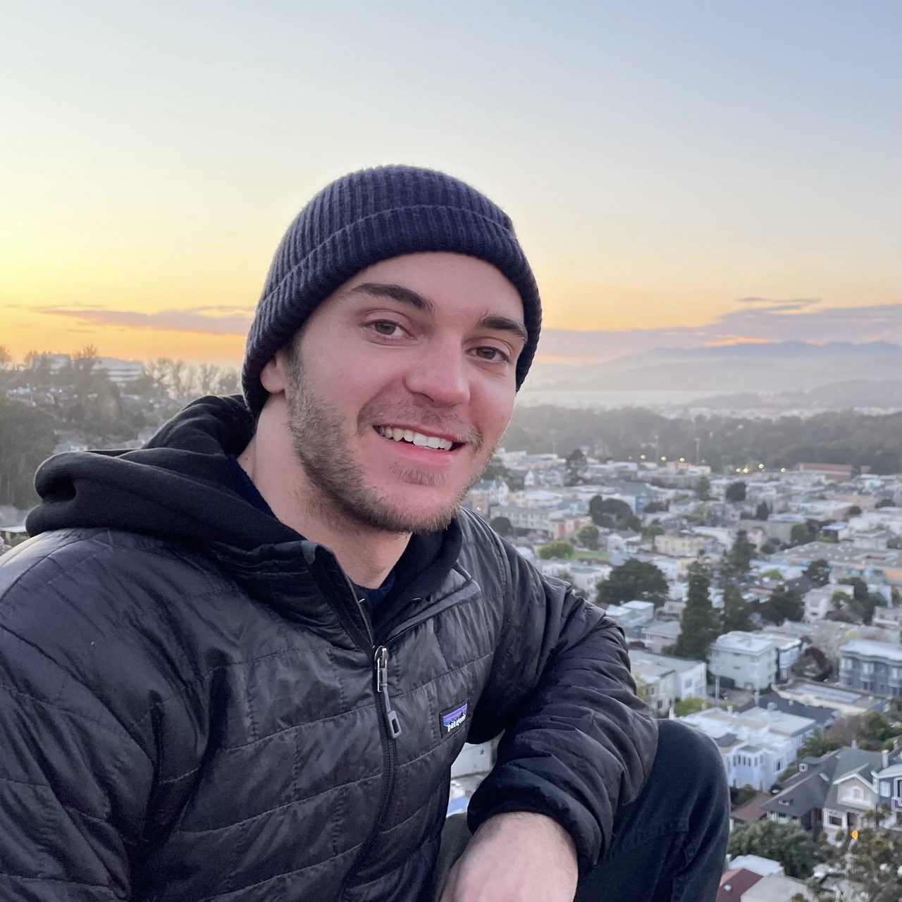 Tom Porkka overlooking a city at sunset